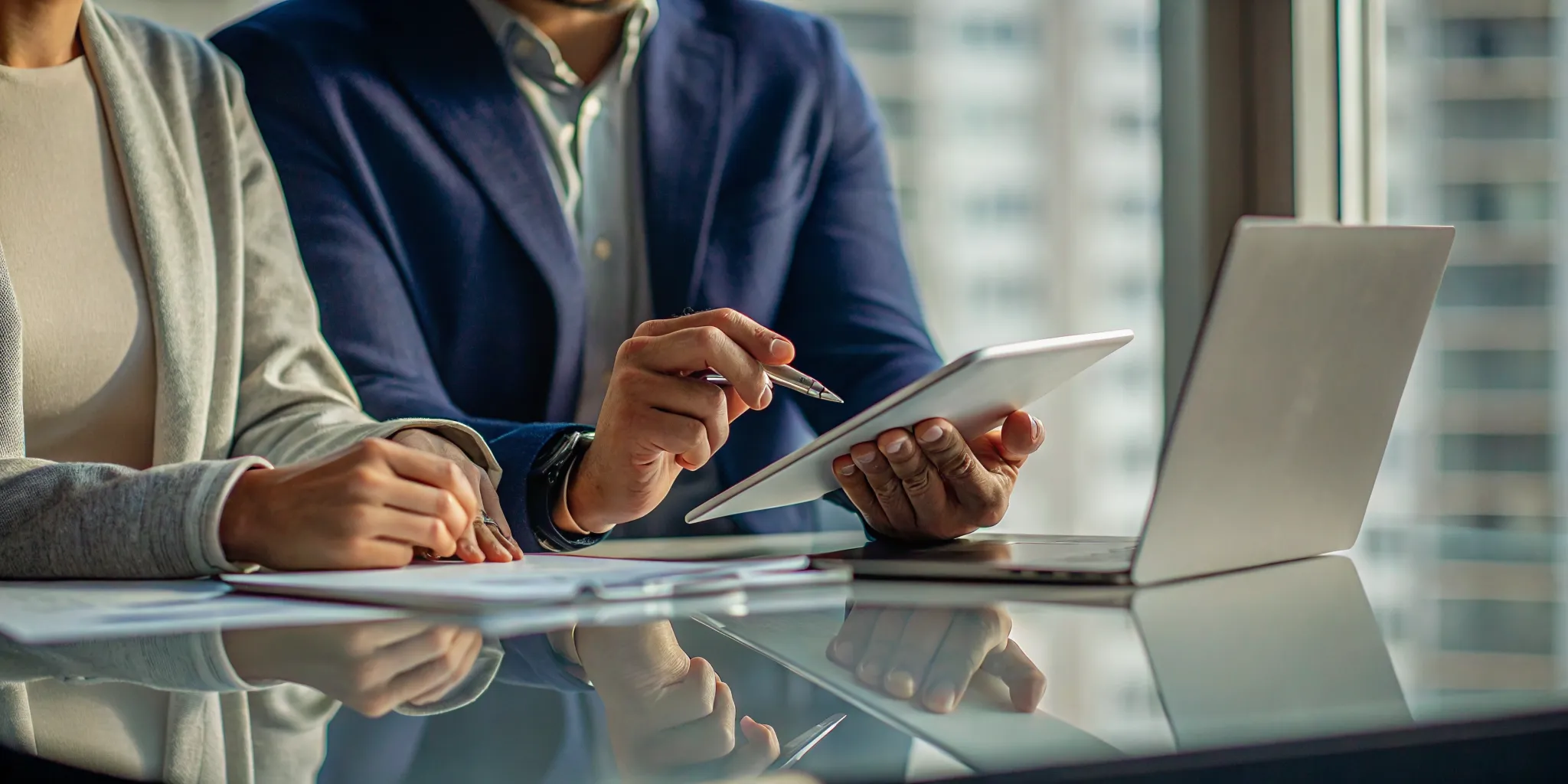 Professionals reviewing denied WSIB survivor benefits appeal documents.